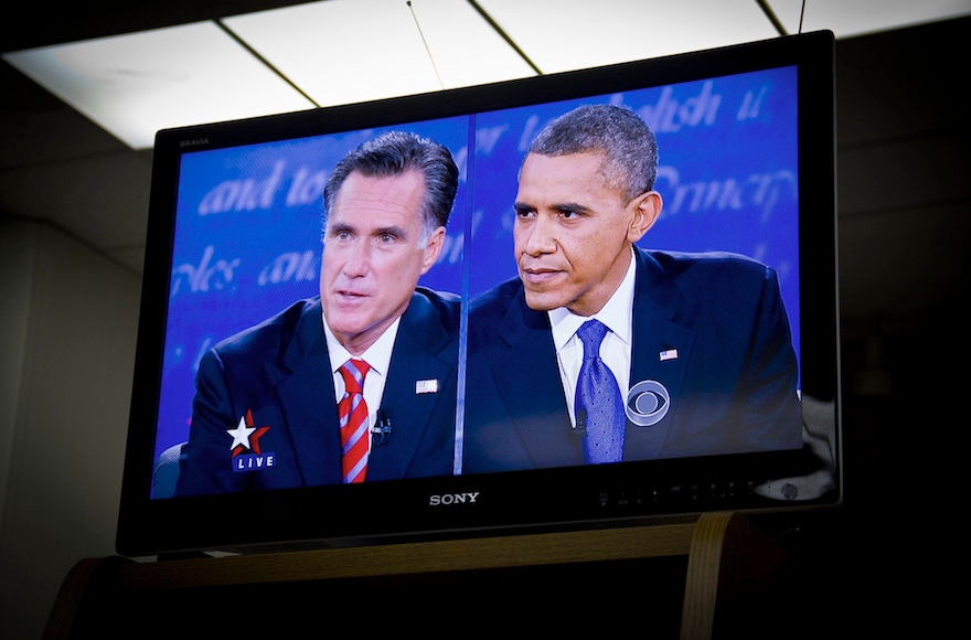 Mitt Romney, left, and President Obama, shown onscreen during their debate on Oct. 22, 2012, were generally in agreement on the Middle East at the Florida one-on-one on foreign policy. (Rosa Trieu/Neon Tommy via CreativeCommons)