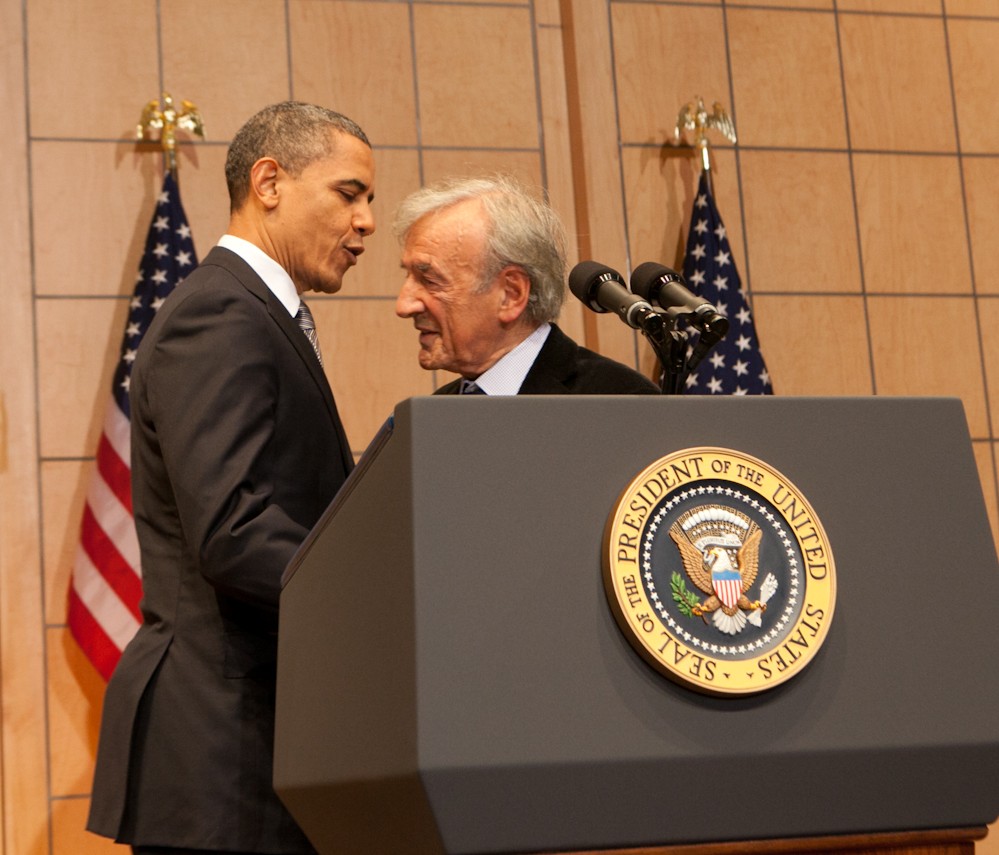 President Obama embraces Elie Wiesel before delivering a speech about the Holocaust and its meaning at the U.S. Holocaust Memorial Museum, April 23 2012. (Courtesy USHMM)