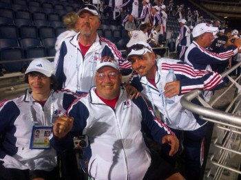 Dave Blackburn, shown at center during last week's opening ceremony, is attending the Maccabiah as a paralympian in table tennis after six previous appearances as an able-bodied softball pitcher. (Courtesy Dave Blackburn) 