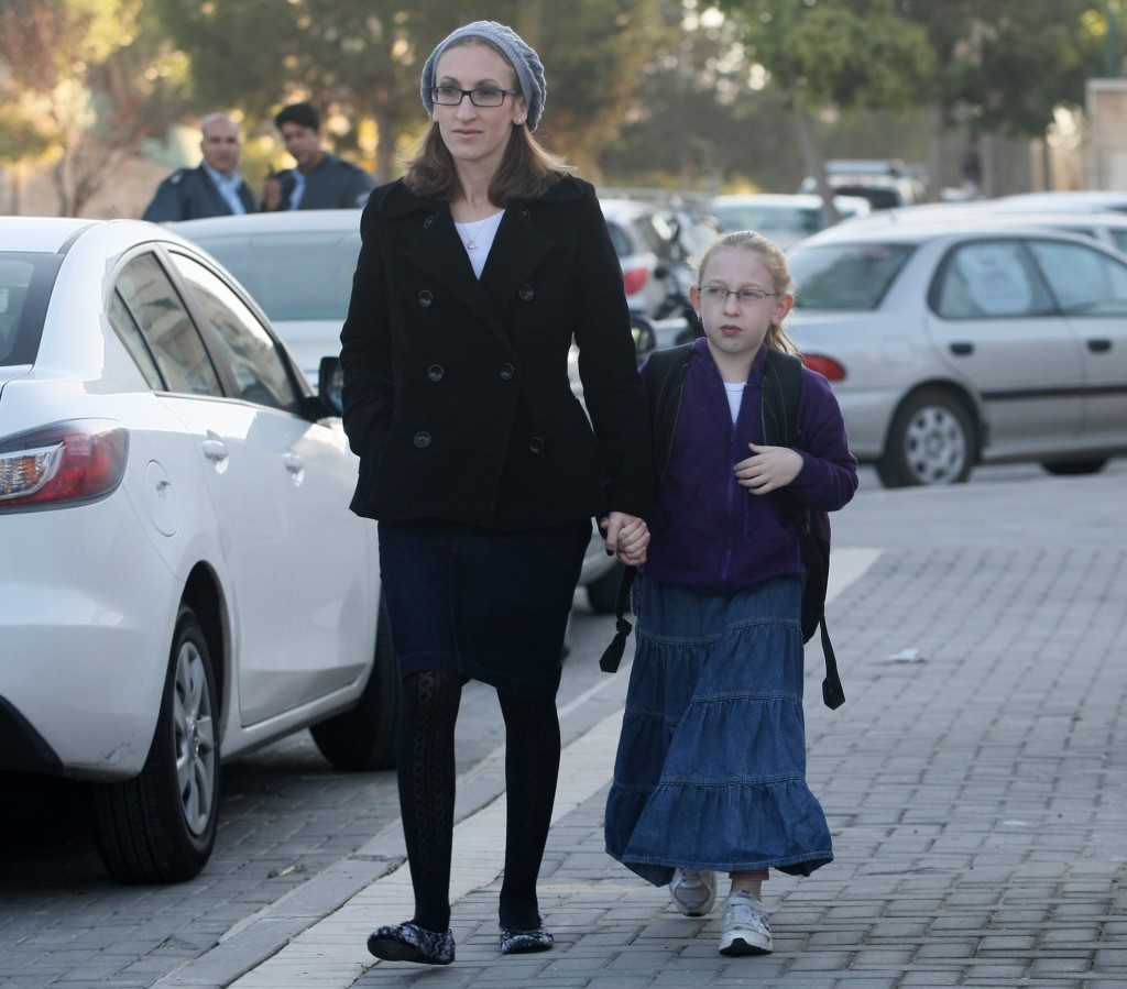 Hadassa Margolese walking her daughter Naama to school in Beit Shemesh a few days after Naama was harassed by haredi Orthodox men, December 2011.(Kobi Gideon / Flash90 / JTA)