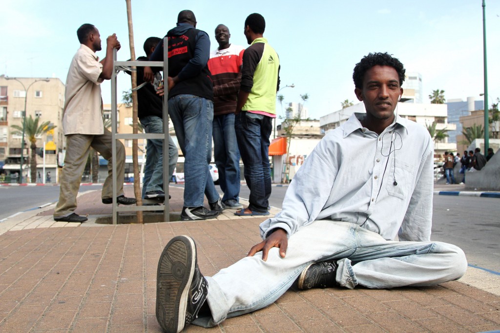 JTA PHOTO: For African migrants in Israel, a life in legal limbo Sudanese and Eritrean refugees gather in the Levinski Park area in south Tel Aviv. (Nicky Kelvin/Flash90/JTA)