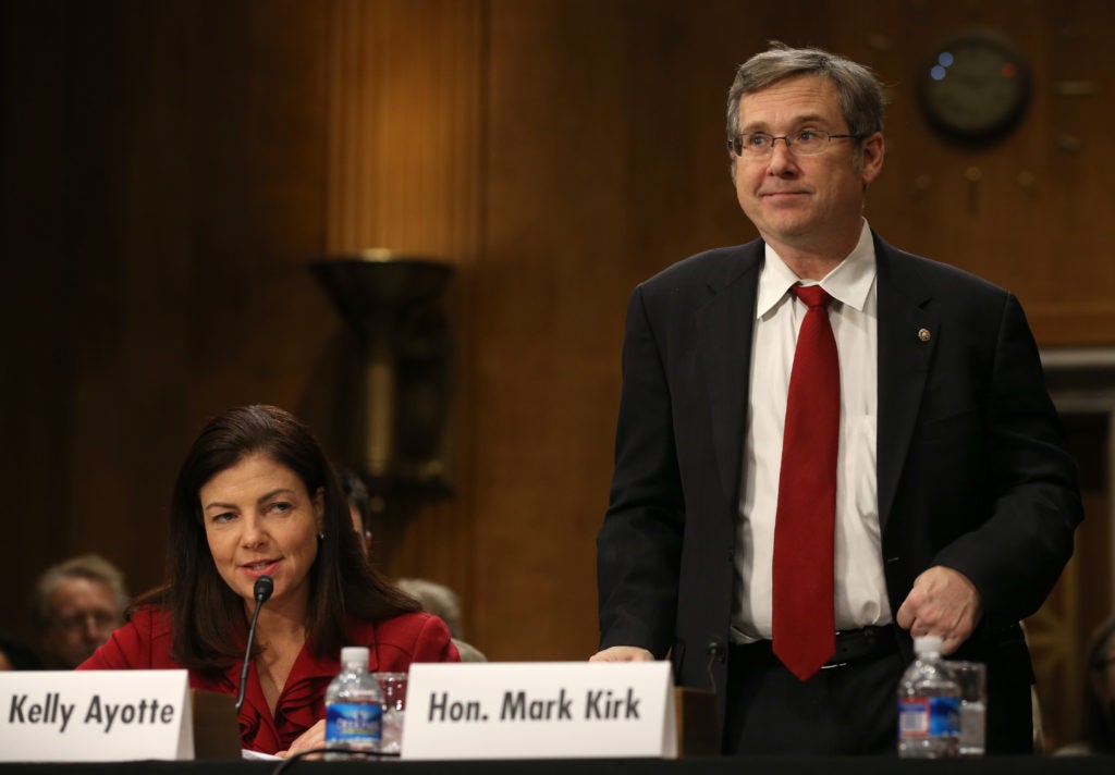 Sen. Mark Kirk, shown here with Sen. Kelly Ayotte testifying before a Senate committee about the Convention on the Rights of Persons with Disabilities on Nov. 5, 2013, has been a leader in pushing for Iran sanctions. (Mark Wilson/Getty Images)