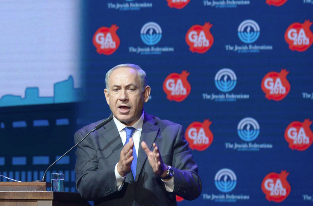 Israeli Prime Minister Benjamin Netanyahu speaks at the General Assembly of Jewish Federations of North America in Jerusalem on Nov. 10, 2013. (Amos Ben Gershom/GPO/FLASH90)