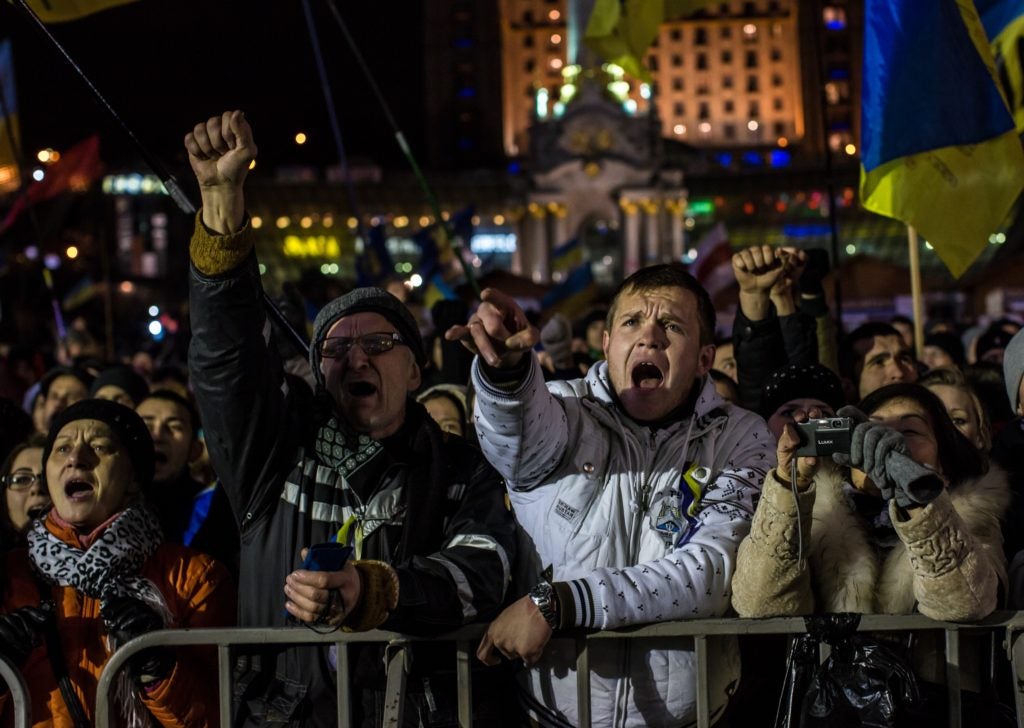 Protesters against the Ukrainian government cheering a speaker in Kiev's Independence Square, Dec. 5, 2013. (Brendan Hoffman/Getty Images)