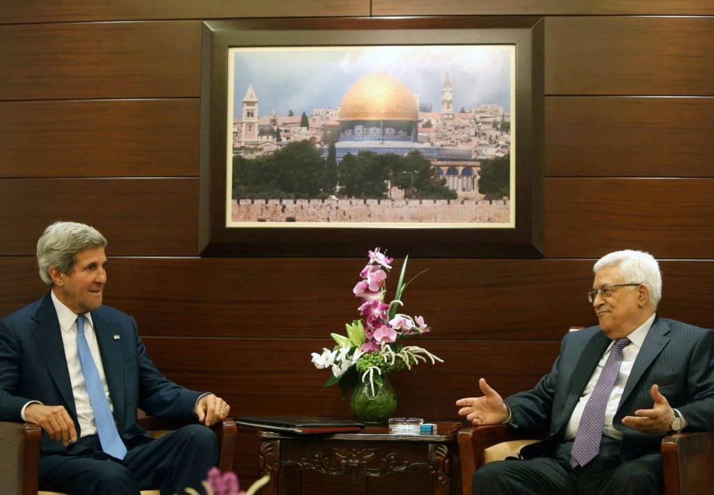 U.S. Secretary of State John Kerry meets with Palestinian Authority President Mahmoud Abbas on July 19, 2013 in Ramallah. (Fadi Arouri, Pool/Getty Images)