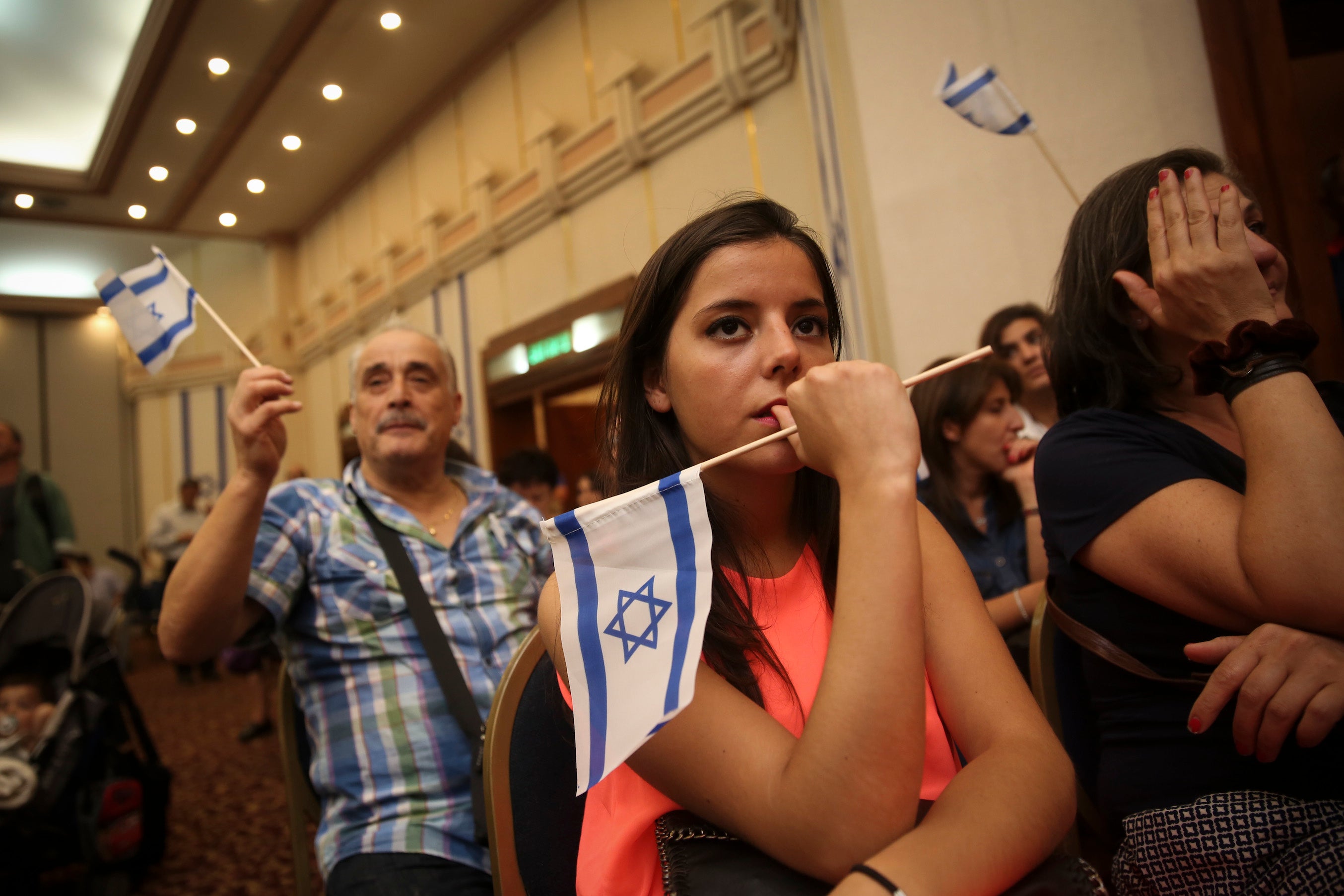 New French immigrants to Israel seen during a welcome ceremony at the Ramada Hotel in Jerusalem, July 17, 2014. (Hadas Parush/Flash90)