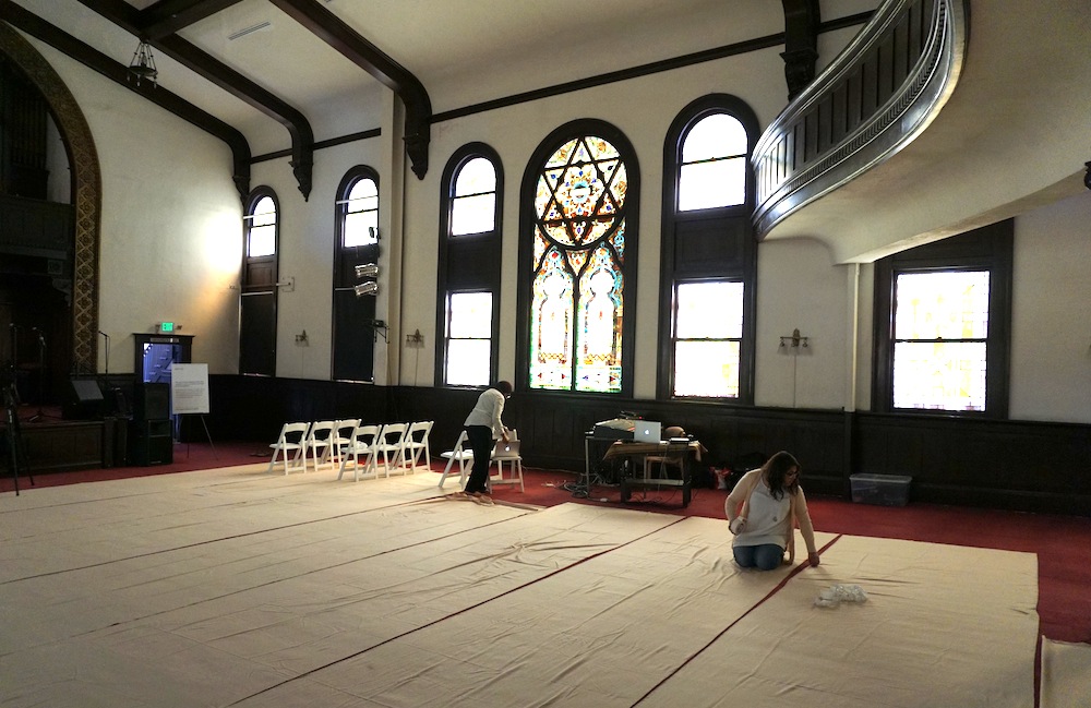 Members of the Women's Mosque of America prepare the sanctuary at Pico Union Project for an afternoon prayer service. (Anthony Weiss)
