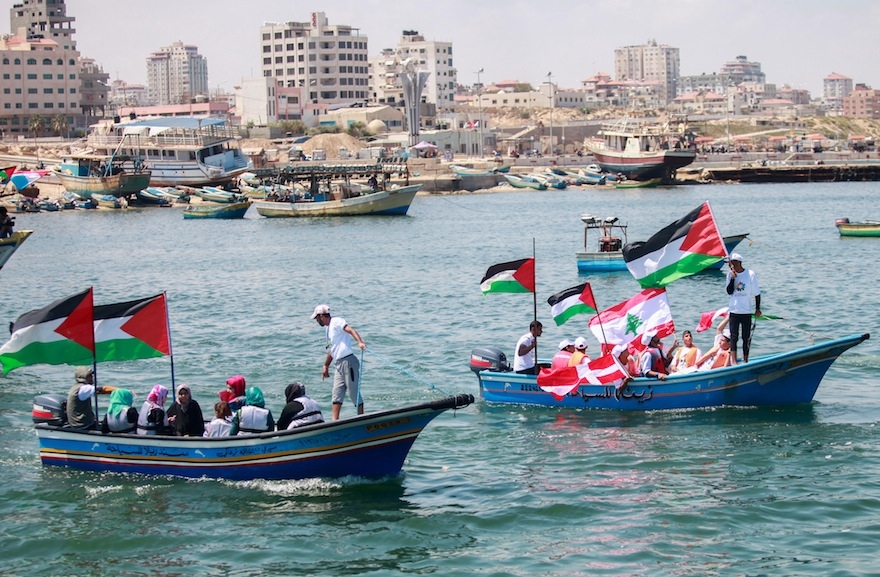 Gazans mark the fifth anniversary of the Mavi Marmara Gaza flotilla at the Gaza City seaport on May 31, 2015. (Aaed Tayeh/Flash90)