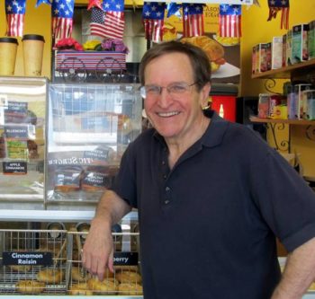 Author and educator Ron Wolfson — in a bagel shop decked out for the holiday — says the Fourth of July is a time to remember. (Edmon J. Rodmon)