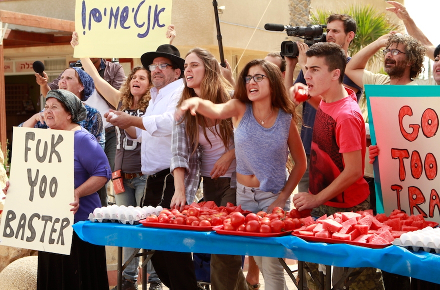 Israelis protesting a United Nations nuclear inspector in a scene from "Atomic Falafel." (Courtesy of Dror Shaul)