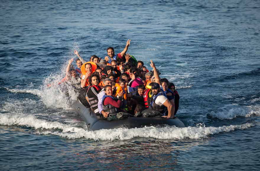 A dinghy carrying refugees arrives at a beach on the island of Lesbos in northern Greece (Boaz Arad/IsraAid) 