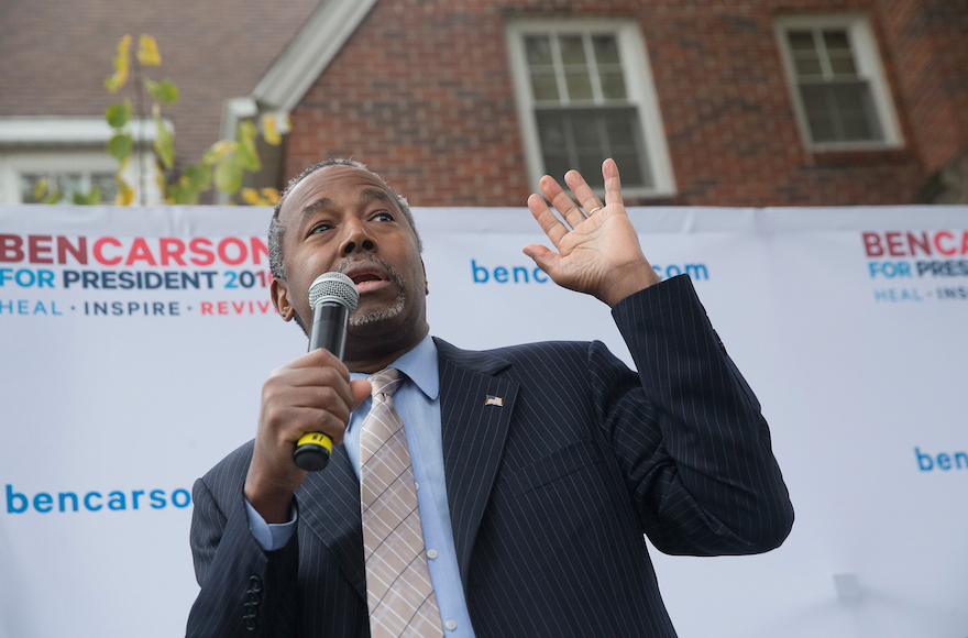 Republican presidential candidate Ben Carson speaking outside the Alpha Gamma Rho house during a campaign stop at Iowa State University in Ames, Iowa, Oct. 24, 2015. (Scott Olson/Getty Images)