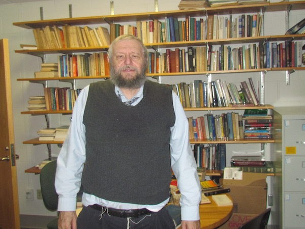 Richard Sugarman, a professor of Jewish philosophy, in his University of Vermont office, Oct. 15, 2015. (Ron Kampeas)