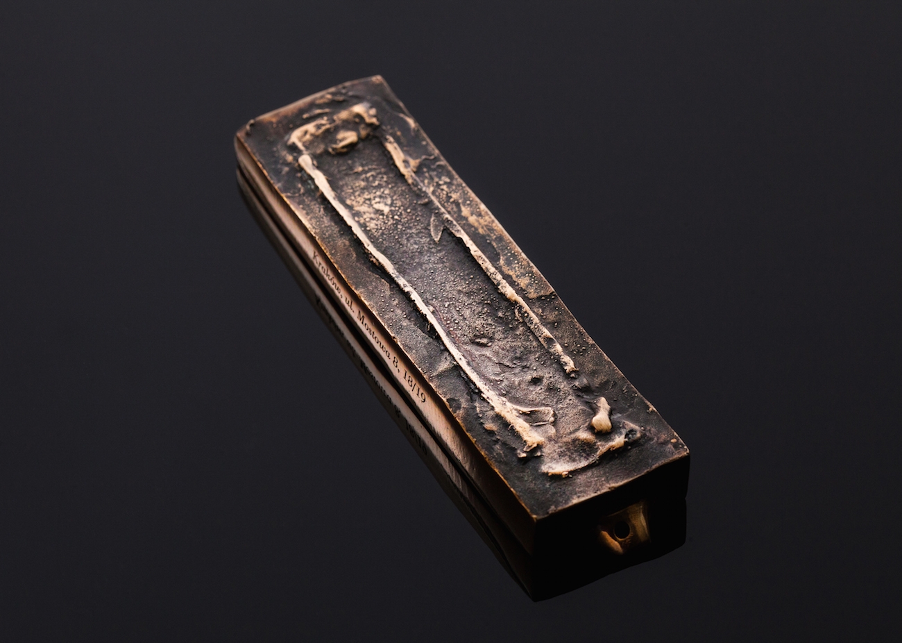One of the bronze mezuzahs made by Mi Polin from a trace of an old Polish mezuzah. (Mi Polin)