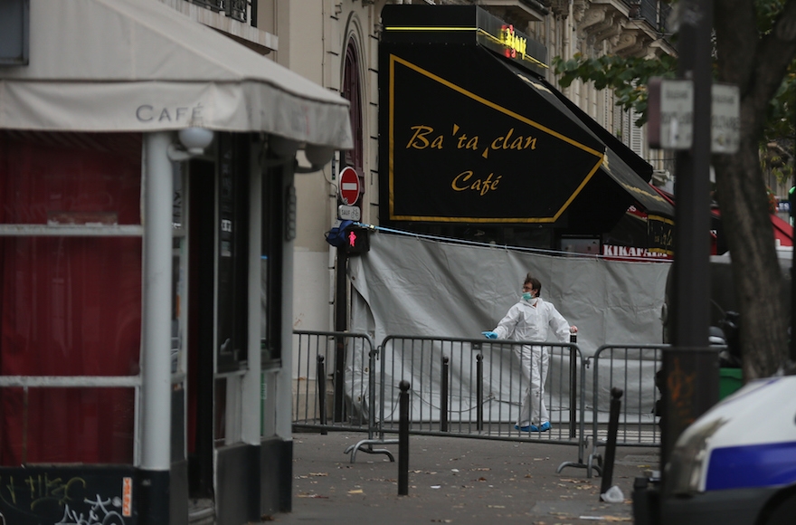 Forensic officers working at the Bataclan Theatre after Friday's terrorist attack in Paris, Nov. 14, 2015. (Christopher Furlong/Getty Images)