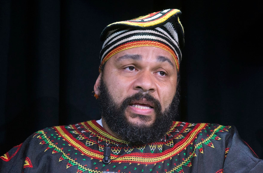French comic Dieudonne M'Bala M'Bala speaking to the media during a press conference in a theater in Paris. (Michel Euler/AP Images)
