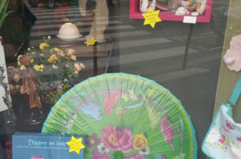 Stars of David advertising sales items at a Parisian housewares shop. (Cnaan Lipschitz)