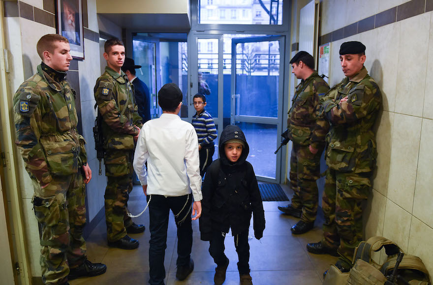 Soldiers guarding staff and children at a Chabad school in Paris, Nov. 16, 2015. (Israel Bardugo, courtesy of the International Fellowship of Christians and Jews)