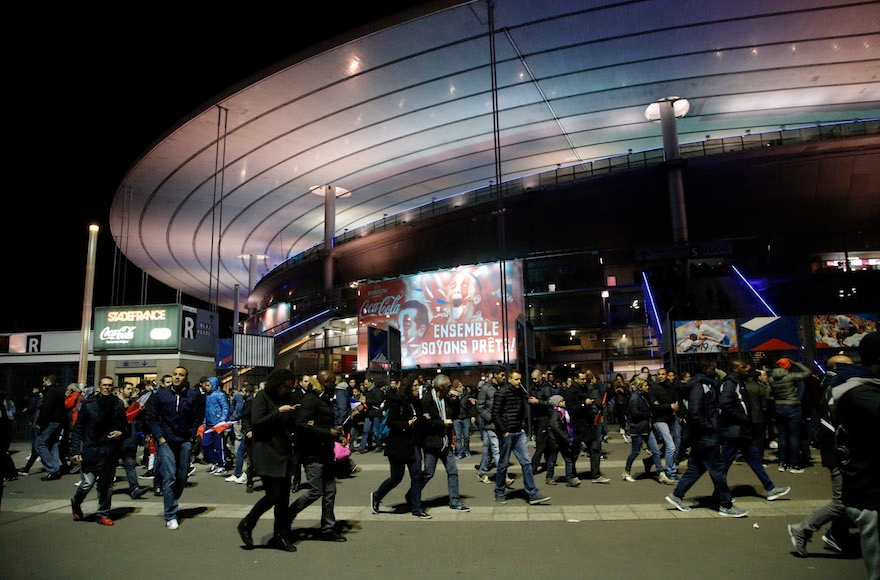 People leaving the Stade de France stadium after the soccer match between France and Germany in Saint Denis, outside Paris, Nov. 13, 2015 (Michel Euler/AP Images)