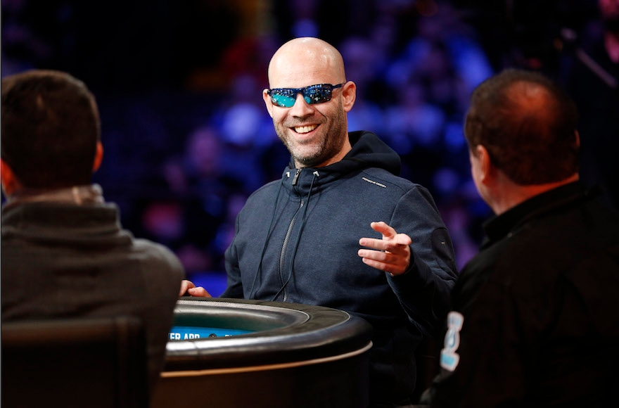 Ofer Zvi Stern motioning before the start of the World Series of Poker Main Event final table in Las Vegas, Nov. 8, 2015. (John Locher/AP Images)