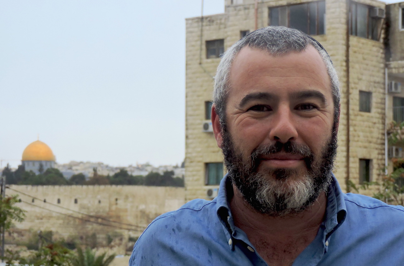 Yishai Fleisher moved with his family to a Jewish enclave inside the Arab neighborhood of Ras al-Amud, adjacent to the Mount of Olives. (Ben Sales)