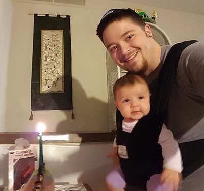 Rafi and Ettie celebrate Hanukkah. (Courtesy of Rafi Daugherty)