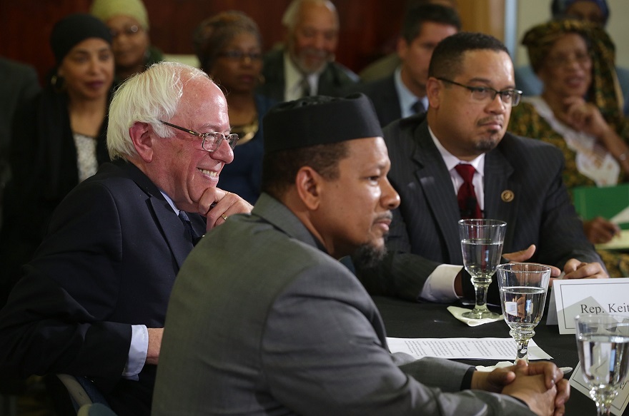Sen. Bernie Sanders is flanked by Rep. Keith Ellison, left, and Imam Talib Shareet at an event at Masjid Muhammad, The Nation's Mosque, in Washington, D.C., Dec. 16, 2015. (Alex Wong/Getty Images)