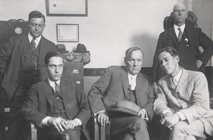 Defense attorney Clarence Darrow, center, meets with his clients Nathan Leopold (seated left) and Richard Loeb (seated right) in 1924. (Courtesy of Charles Deering McCormick Library of Special Collections, Northwestern University)