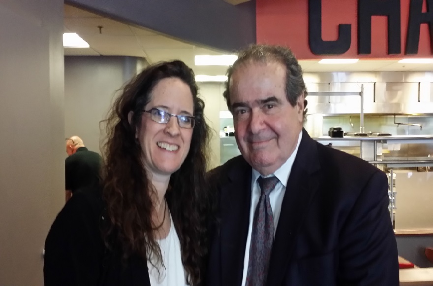 Supreme Court Justice Antonin Scalia with Alyza Lewin, daughter and law partner of Nathan Lewin, at the Char Bar kosher restaurant in Washington, D.C., May 2015. (Courtesy of Nathan Lewin)