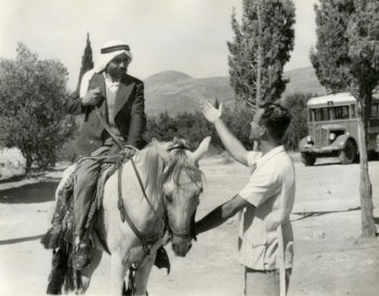 An Arab neighbor visiting a friend in Kibbutz Kfar Giladi,1945-1946. (Herbert Sonnenfeld/Courtesy of Beit Hatfutsot)