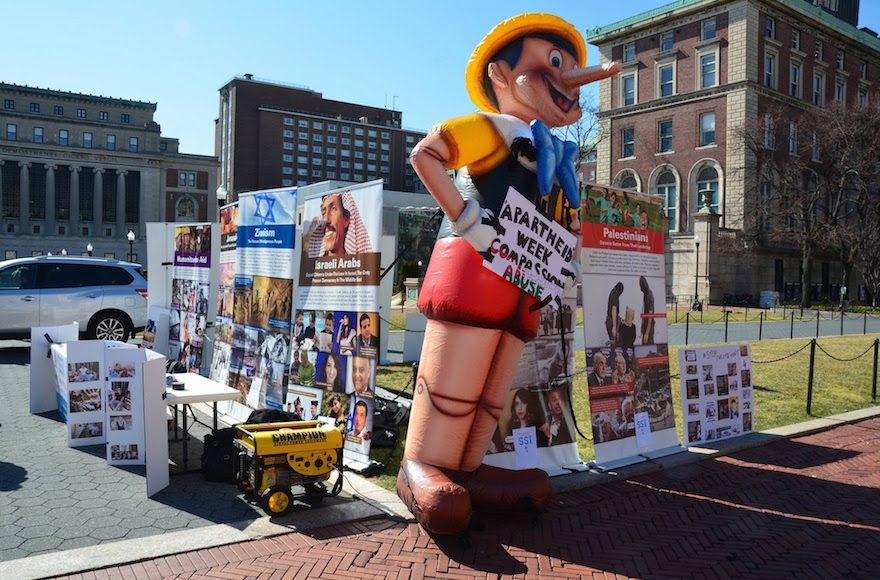 During Israel Apartheid Week at Columbia University, pro-Israel students countered anti-Israel displays with a 12-foot-tall Pinocchio doll meant to call attention to 