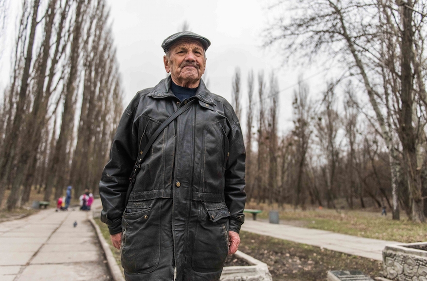 Vladimir Proch, a Ukrainian Jew, standing near Kiev's Babi Yar monument, March 14, 2016. (Cnaan Liphshiz)