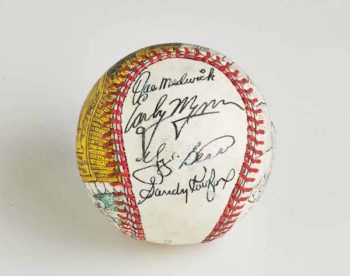 A custom baseball signed by Sandy Koufax and other Hall of Famers, like Yogi Berra JEFF AEDER PHOTO