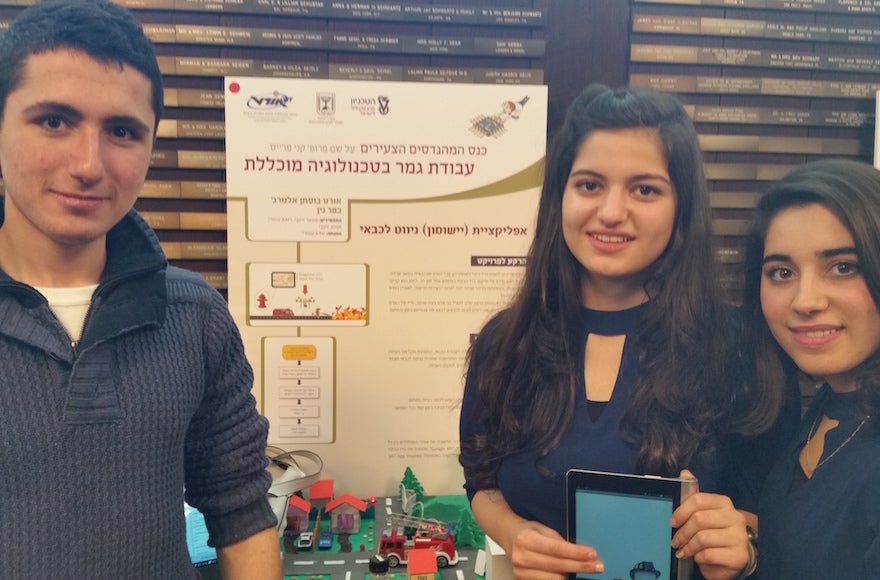 Tamim Zoabi, Masar Zoabi and Rua'a Omari (left to right) are the first Arab-Israeli team ever to win a prize in the Young Engineers' Conference. (Danny Seaman)