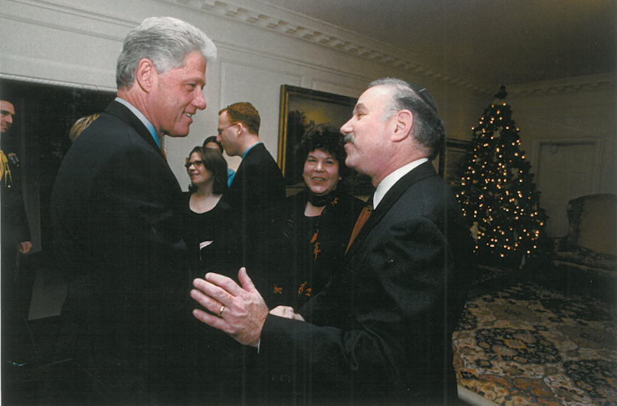 Bob and Helene Fine meet President Bill Clinton at the White House in December 2000, a few months after hosting First Lady Hillary Clinton and Chelsea for Passover seder. (Courtesy of Bob Fine)