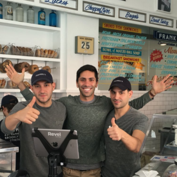 Alex Frankel, left, and Zach Frankel, right, with Nev Schulman from the MTV show "Catfish" inside Frankel's Delicatessen. (Screenshot from Instagram)