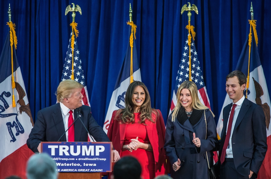 Republican presidential candidate Donald Trump, left, standing on with his wife Melania Trump, daughter Ivanka Trump and son-in-law Jared Kushner (left to right) at a campaign rally at the Ramada Waterloo Hotel and Convention Center in Waterloo, Iowa, Feb. 1, 2016. (Brendan Hoffman/Getty Images)