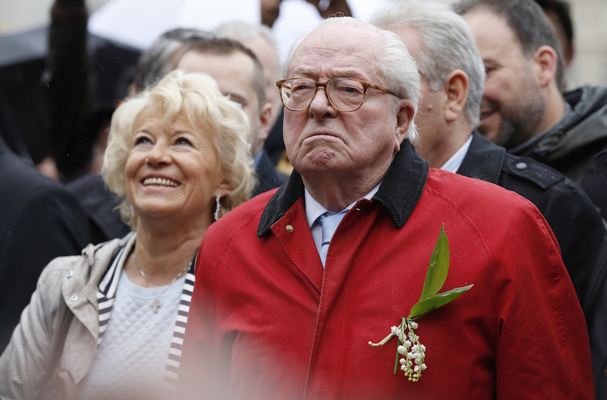French far-right party Front National founder and honorary president Jean-Marie Le Pen looking on at the foot of a statue of Joan of Arc during the party's annual rally in honour of Joan of Arc in Paris, May 1, 2015. (Thomas Samson/AFP/Getty Images)