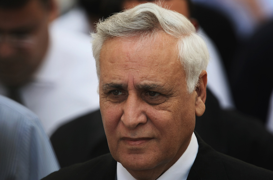 Moshe Katsav walking out from the Supreme Court in Jerusalem on November 10, 2011. Israel's Supreme Court on Thursday unanimously upheld the Tel Aviv District Court's decision to convict former President Moshe Katsav of two counts of rape and other sexual offenses, and to sentence him to seven years in prison. Photo by Kobi Gideon / Flash90.