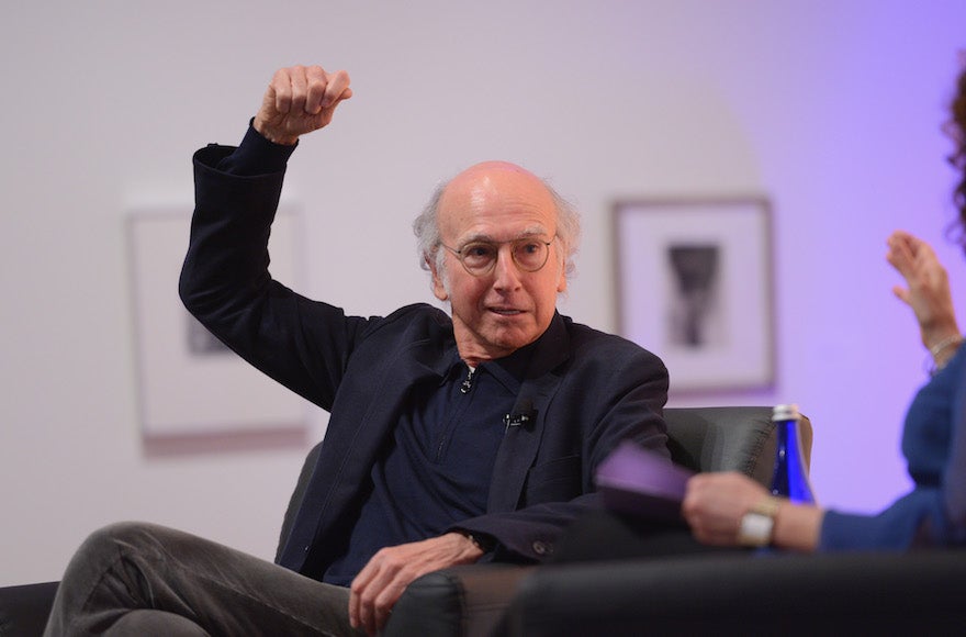 Larry David speaking on stage at the VIP closing dinner during Advertising Week AWXII at Sotheby's in New York City, Oct. 1, 2015. (Andrew Toth/Getty Images for AWXII)