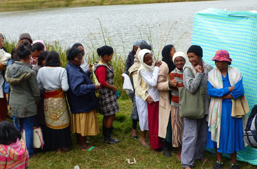 Malagasy women getting ready to immerse in the river before converting to Judaism, near Antananarivo, Madagascar, May 2016. (Deborah Josefson) 