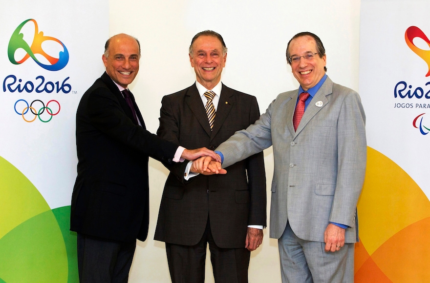 The Jewish trio in charge of Rio Olympics: Carlos Arthur Nuzman between Sidney Levy, left, and Leonardo Gryner, Nov. 9, 2012. (Marcio Rodrigues)