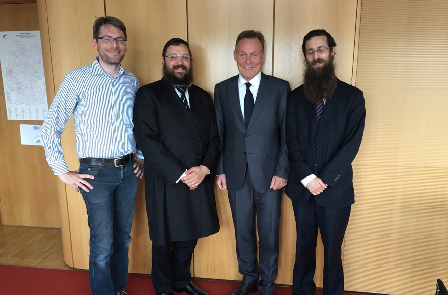 Yehudah Teichtal, second from left, and Thomas Oppermann, third from left, in Berlin on June 28, 2016. (Courtesy of Yehudah Teichtal's office)