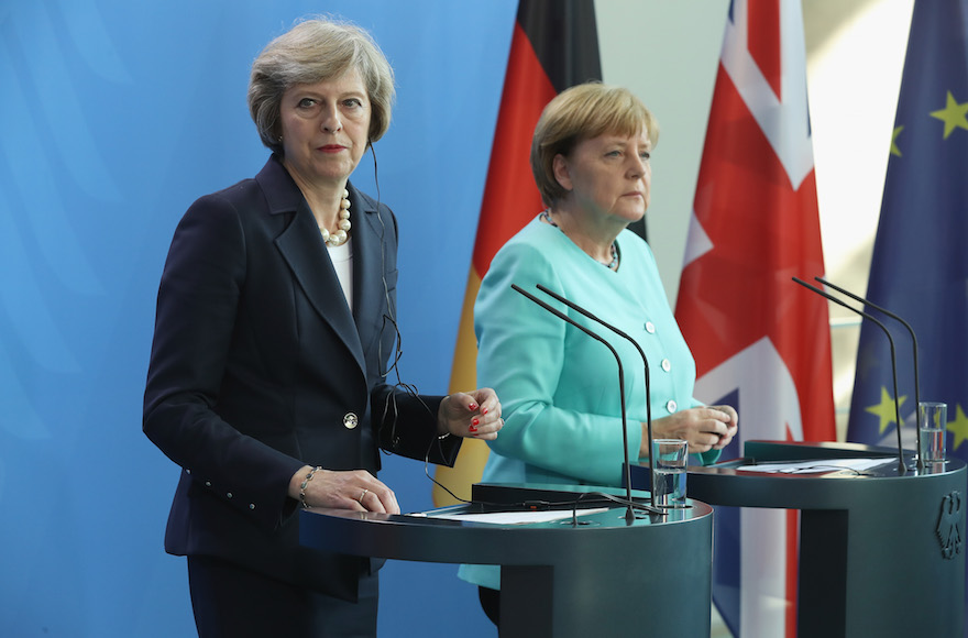 German Chancellor Angela Merkel, right, and British Prime Minister Theresa May speaking to the media following talks at the Chancellery in Berlin, July 20, 2016.(Sean Gallup/Getty Images)