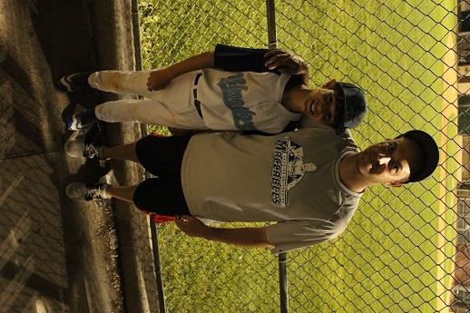 Jacob Steinmetz and his father, Elliott, walk to games on Shabbat -- but teammates take care of their gear and food. (Hillel Kuttler)
