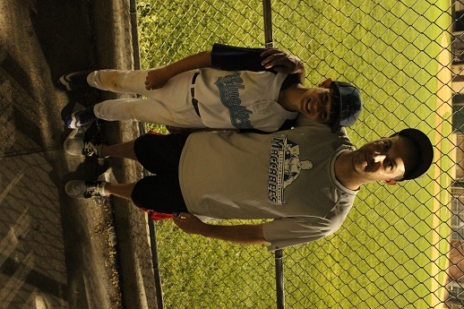 Jacob Steinmetz and his father, Elliott, walk to games on Shabbat -- but teammates take care of their gear and food. (Hillel Kuttler)