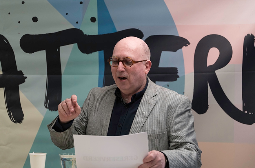 Michel Waterman, director of the Crescas Dutch Jewish cultural group, during a debate at the Crescas offices in Amsterdam on April 5, 2016. (Photo Courtesy of Crescas)