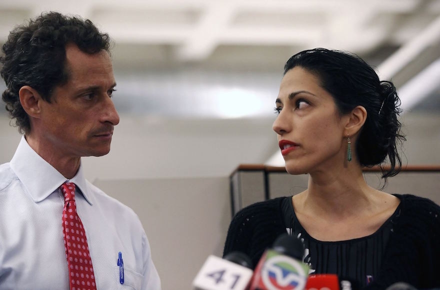 Anthony Weiner and Huma Abedin at a news conference in New York City at which Weiner acknowledged that he engaged in lewd online conversations with a woman after his resignation from Congress, July 23, 2013.(John Moore/Getty Images)