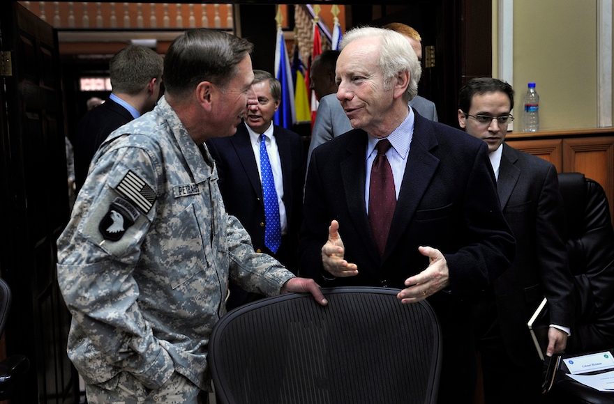 Sen. Joe Lieberman, right, talking to Gen. David Petraeus at the International Security Assistance Force Headquarters in Afghanistan during a congressional delegation tour, Nov. 10, 2010. (Joshua Treadwell)