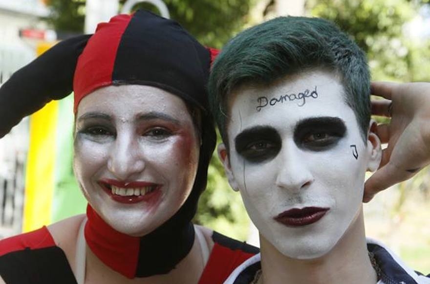 Two visitors to the Icon Festival dressed as Suicide Squad supervillians Harley Quinn and Joker in Tel Aviv, Oct. 19, 2016. (Dan Ofer)